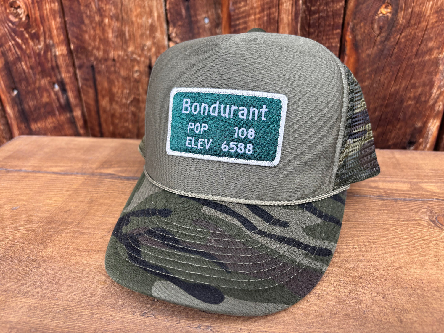 Trucker hat with a Bondurant, Wyoming road sign patch