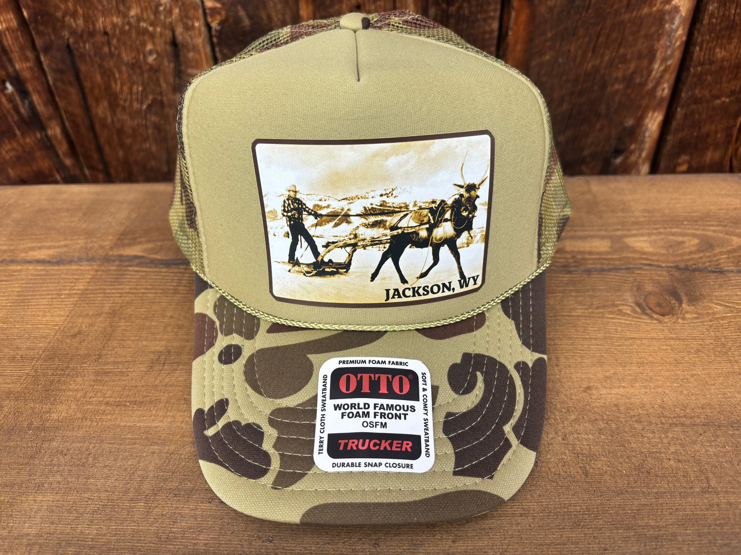 Fuzzy Trucker hat, elk in harness pulling a sleigh, Jackson Hole