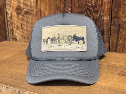 Pack Trip Trucker hat with a Jackson Hole horseback hunting photograph patch